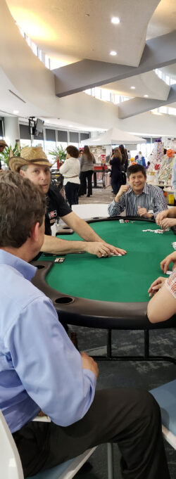 men sitting at a casino table